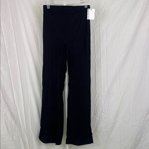 Bandier black sport logo slit legging with a slight flare size small NWT